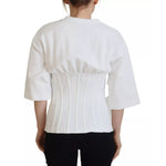 Back view of a model wearing Dolce & Gabbana White Cotton Corset Stretch Top T-shirt with short sleeves and zipper detailing.