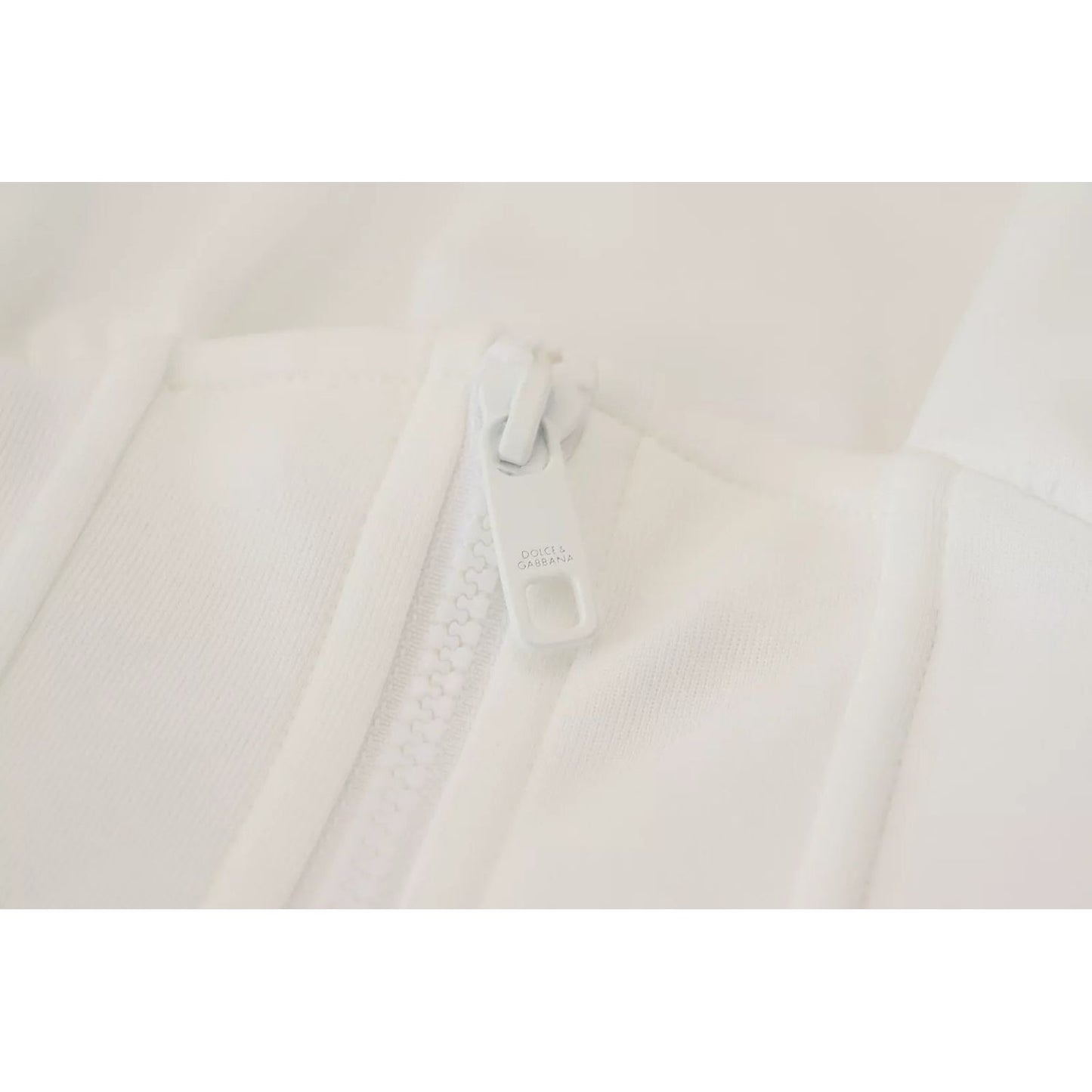 Close-up of zipper on Dolce & Gabbana White Cotton Corset Stretch Top T-shirt, highlighting fabric texture and logo details.