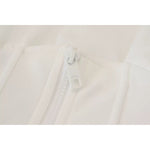 Close-up of zipper on Dolce & Gabbana White Cotton Corset Stretch Top T-shirt, highlighting fabric texture and logo details.