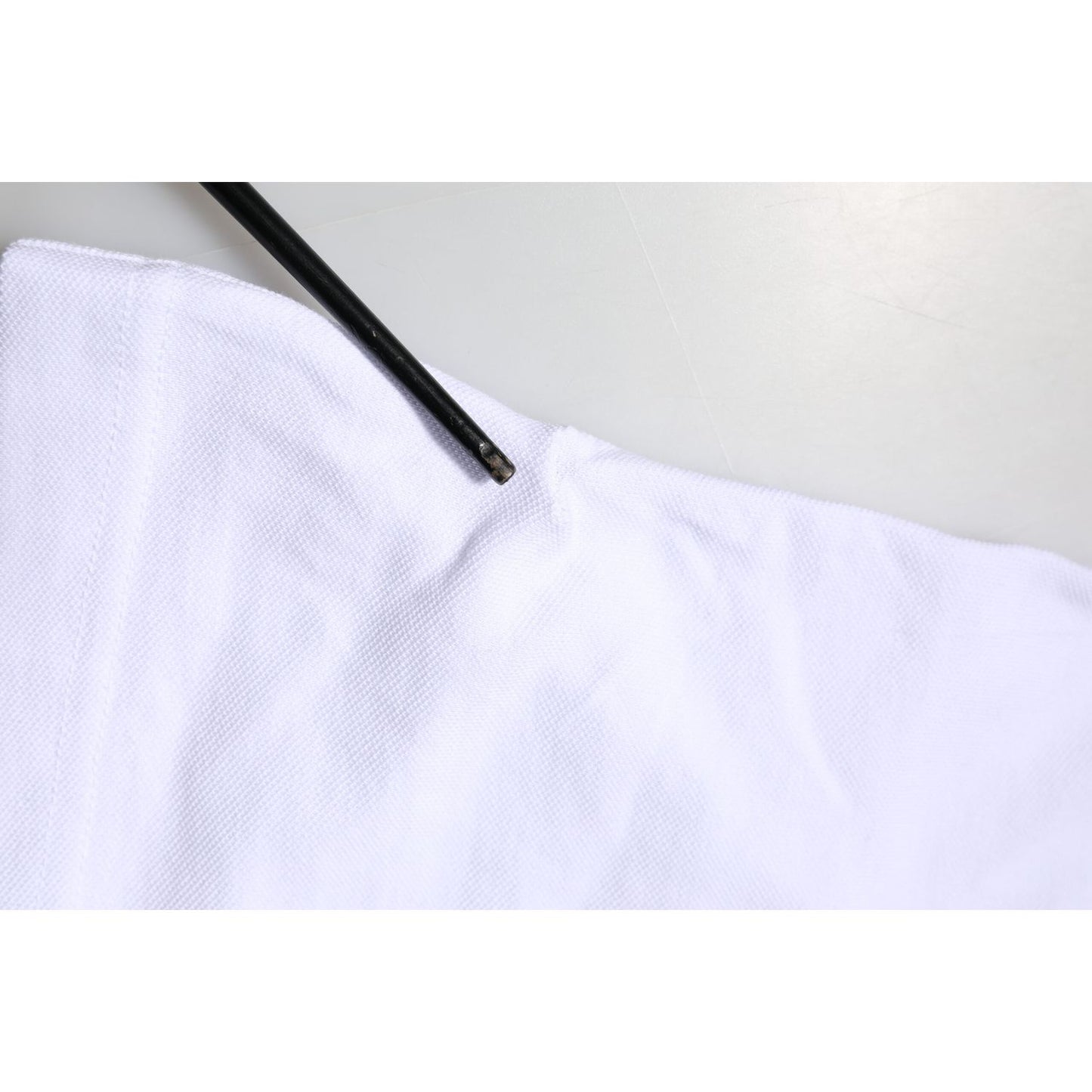 Close-up of Dolce & Gabbana White Cotton DG Heart Logo Embroider T-shirt fabric.