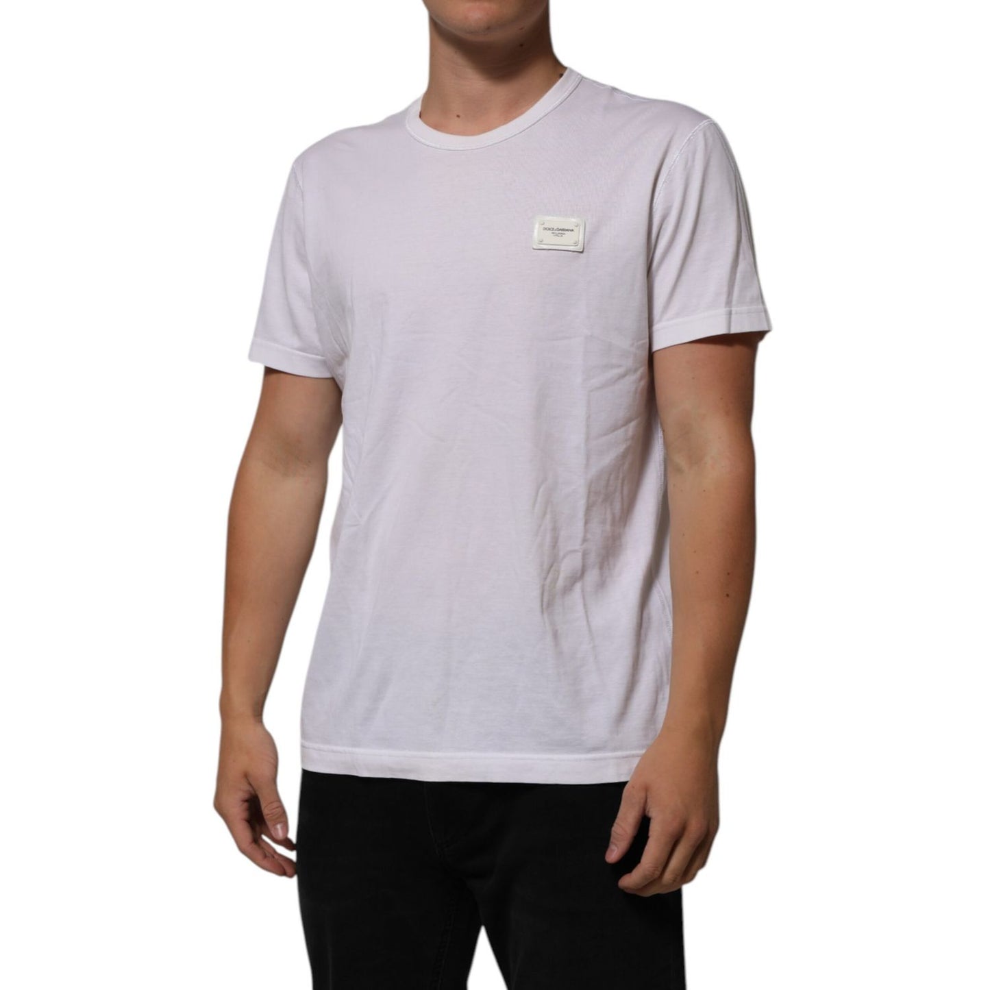 Dolce & Gabbana White Cotton Logo Patch Crew Neck Men T-shirt, model wearing short sleeve white tee with logo patch on chest.