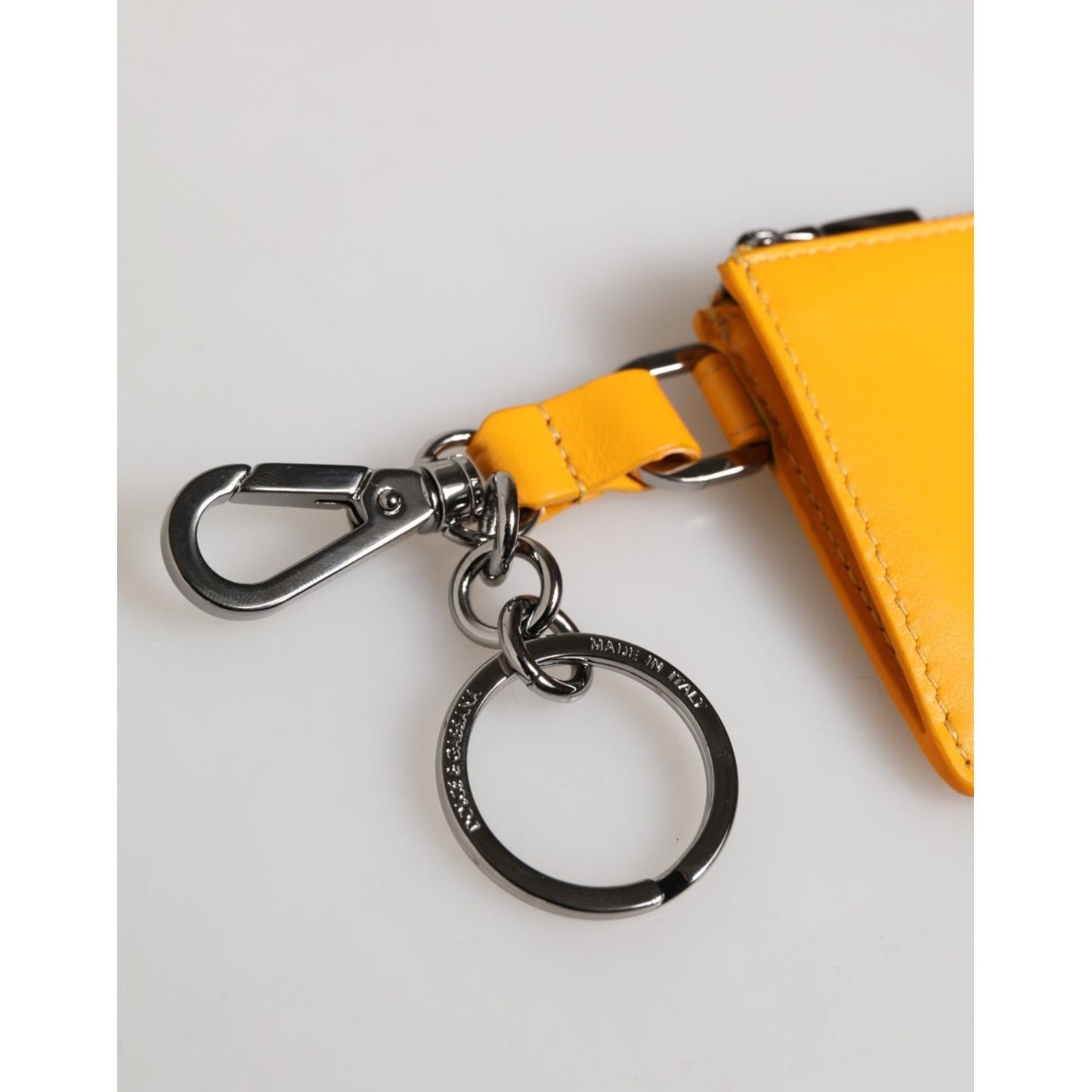 Dolce & Gabbana Yellow Orange Leather Credit Card Key Holder Clip On Wallet with metal keychain detail, close-up view.