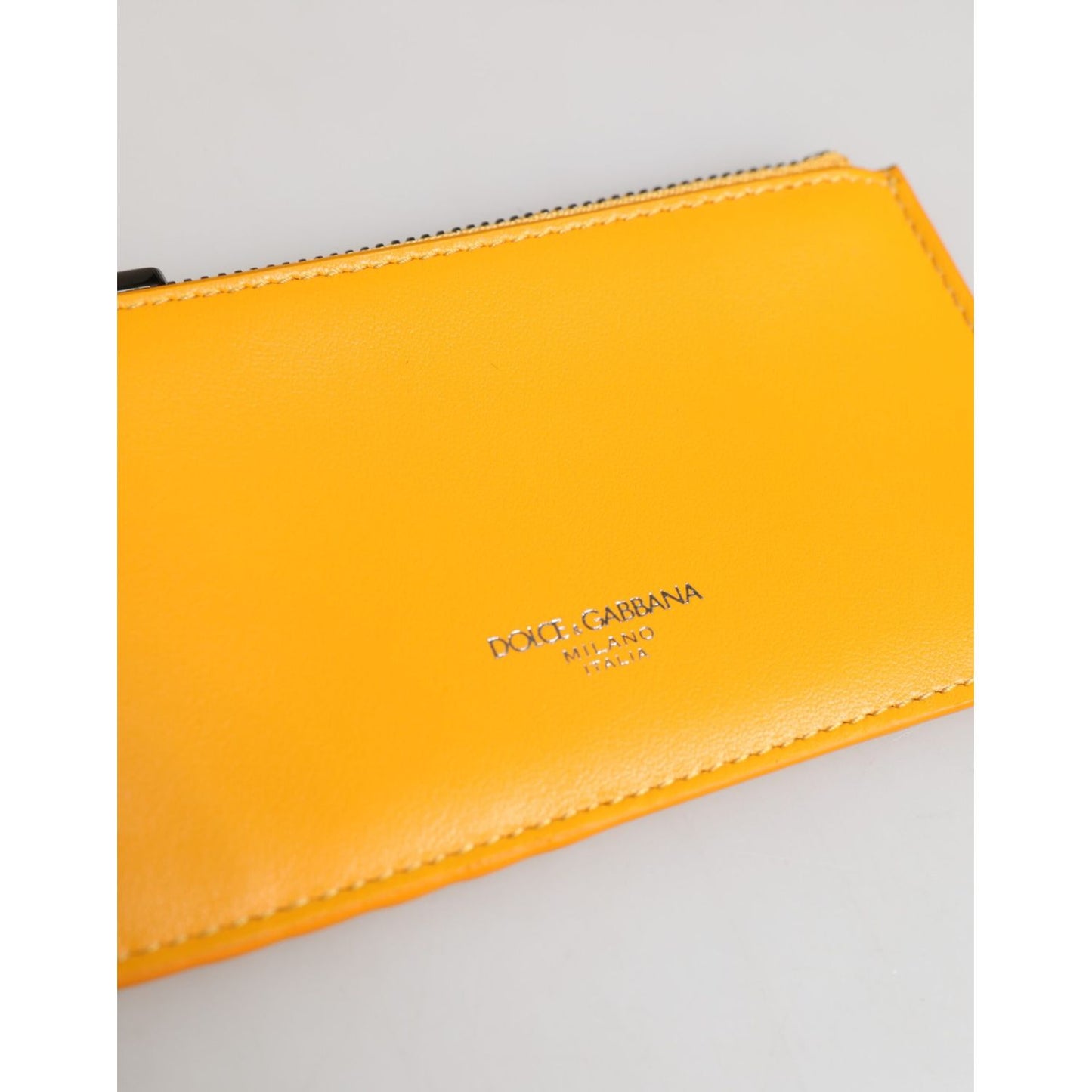 Dolce & Gabbana Yellow Orange Leather Credit Card Key Holder Clip On Wallet showcasing vibrant color and logo detail.