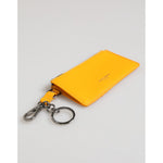 Dolce & Gabbana Yellow Orange Leather Credit Card Key Holder Clip On Wallet with clip-on key holder and zipper closure, made in Italy.