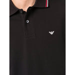 Emporio Armani T-shirts and Polos Black with logo print, classic collar, front button placket, short sleeves, and straight hem.