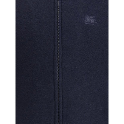 Close-up of Etro Blue Wool Bomber showing front zipper and embroidered Pegasus logo adding elegance to the wool blend design.