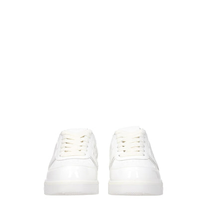 Givenchy White Leather Low Top Sneakers, front view with lace-up closure and rubber soles, featuring logos on front, side, and back.