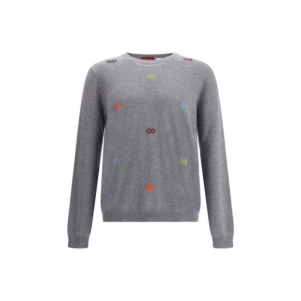 Gucci Gray Cashmere Sweatshirt with multicolor jacquard logo, ribbed crew neck, cuffs and hem, made of 100% cashmere wool.