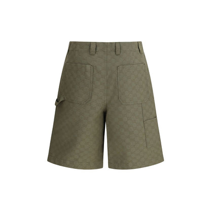 Gucci Green Cotton Bermuda Shorts with iconic GG pattern, featuring front zipper, button closure, and belt loops for a versatile look.