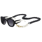 Alt Tag: Carolina Herrera Mod. HER 0254_S acetate lady sunglasses with chain accessory.
