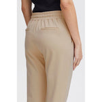 Back view of ICHI Beige Polyester Pant with elastic waistband and tailored fit, highlighting comfort and style for modern women.