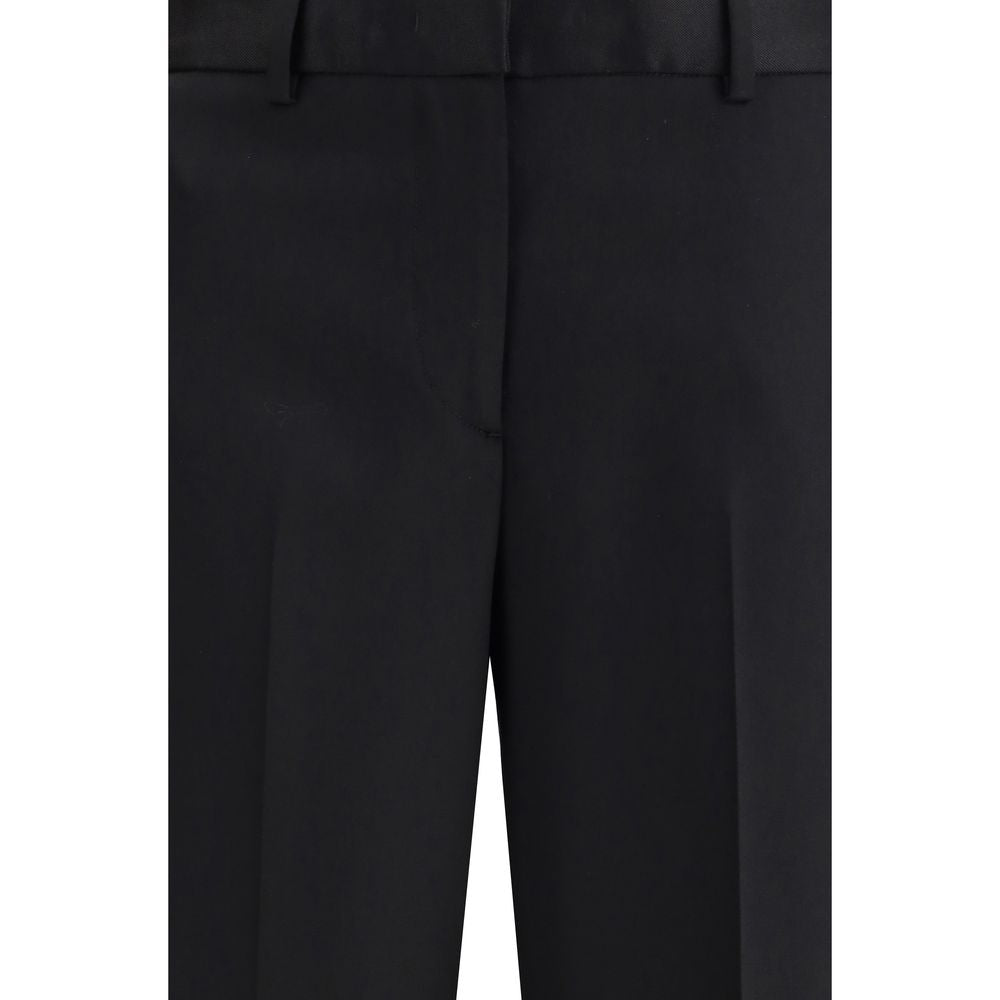 Lardini Black Wool Dress Pants with zipper closure, belt loops, and welt pockets for a classic elegant look, made of 100% wool.