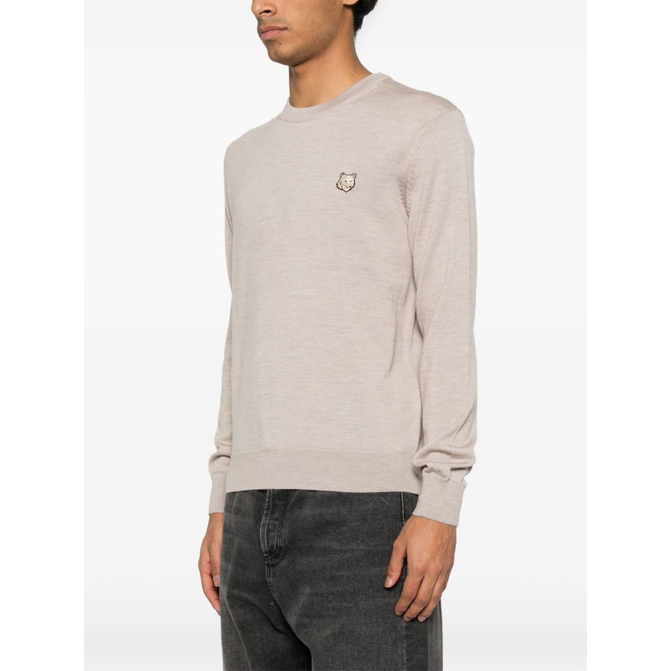 Maison Kitsuné Maison Kitsune Fox motif sweater in light beige, shown on model, crew neck, long sleeves, ribbed cuffs, wool jumper.