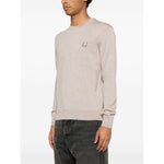 Maison Kitsuné Maison Kitsune Fox motif sweater in light beige, shown on model, crew neck, long sleeves, ribbed cuffs, wool jumper.