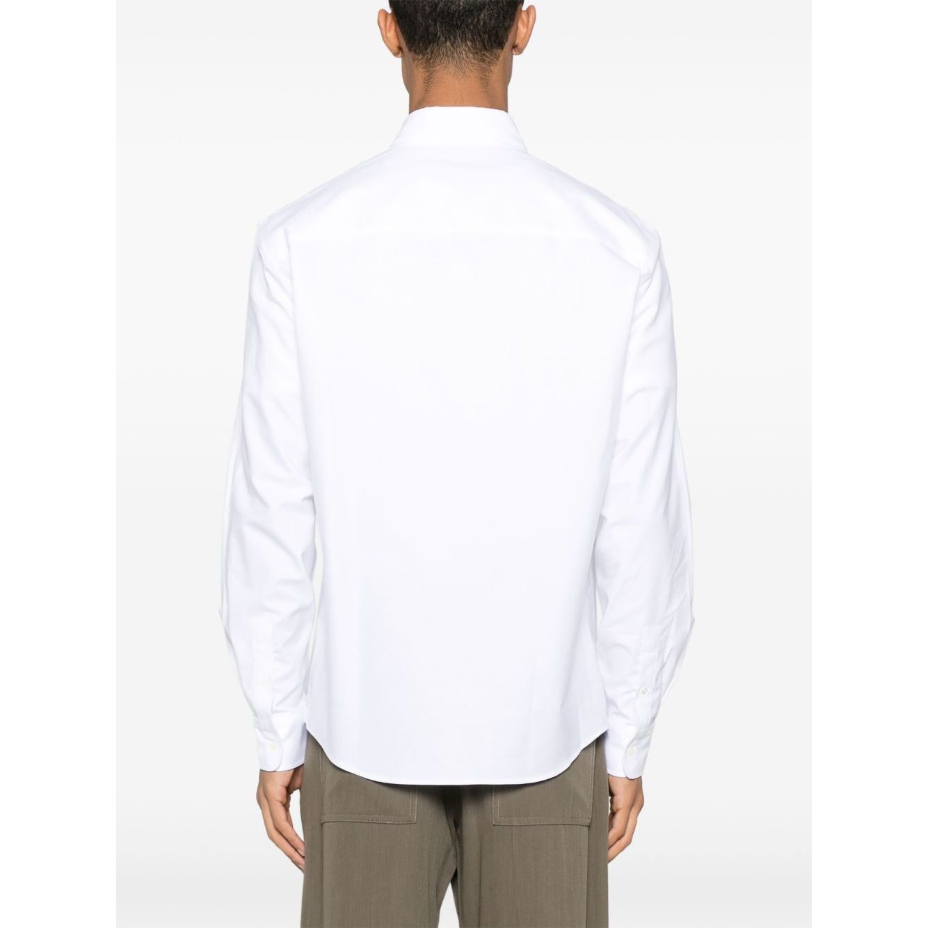 Back view of Maison Kitsuné Maison Kitsune classic shirt wth fox head logo, white button-down with curved hem and buttoned cuffs.