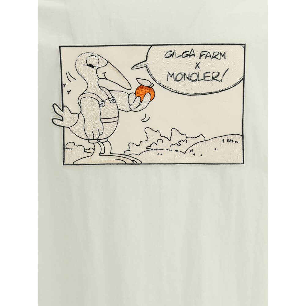 Moncler x Donald Glover White Cotton Coat with Gilga Farm comic-style patch and Moncler branding.