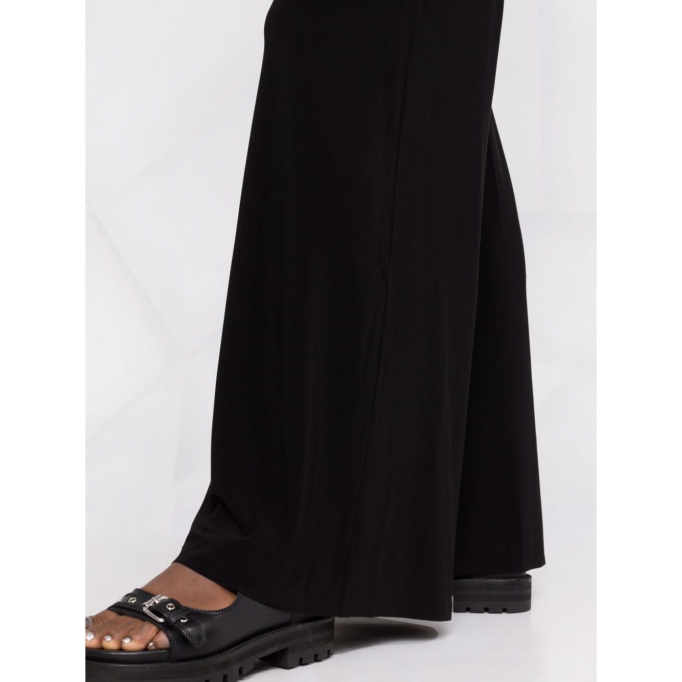 Norma Kamali Trousers Black high-waisted flared Elephant jersey with side slit pockets, regular length.