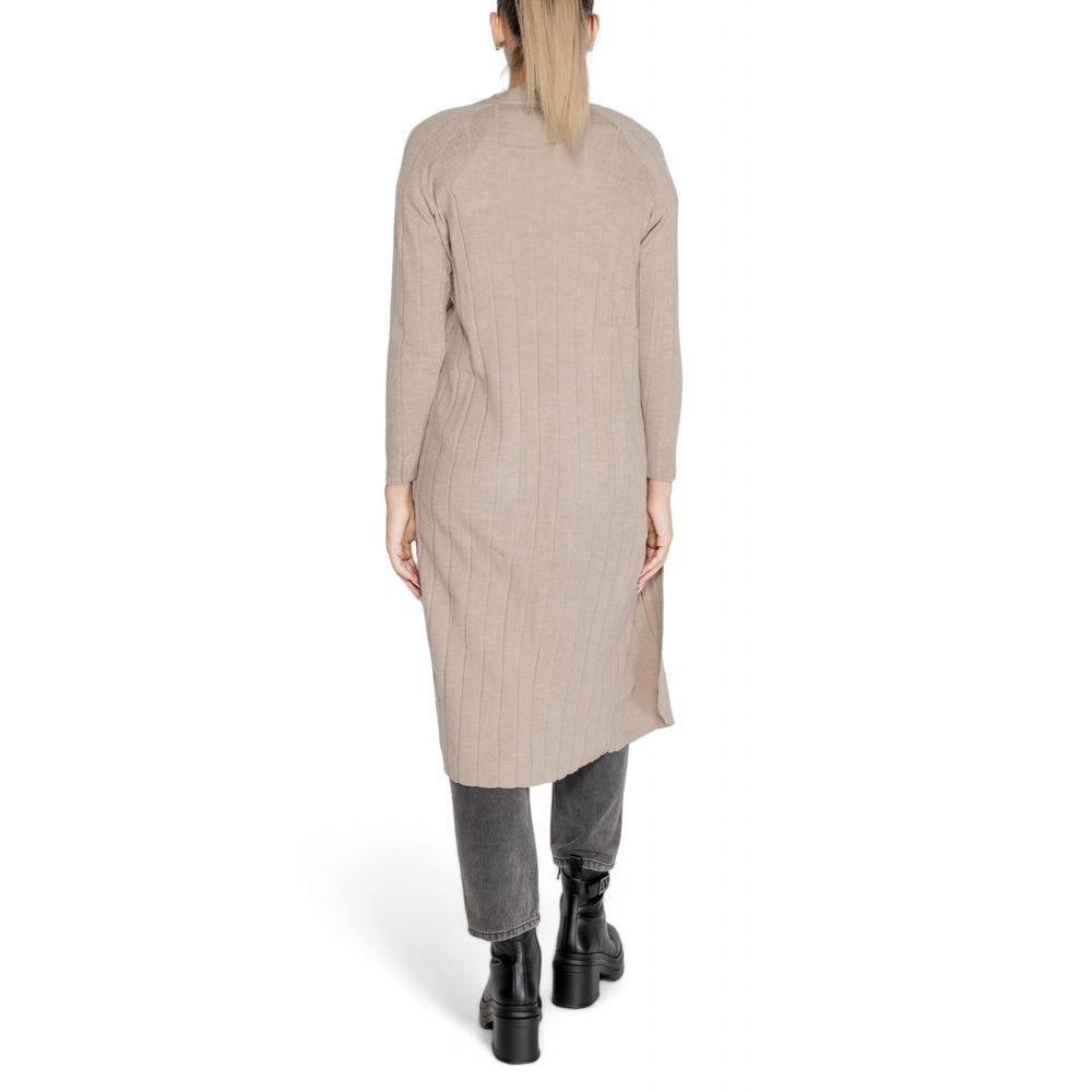 Back view of a model wearing Only Beige Marabou Cardigan, showcasing the long open design, ideal for layering in autumn and winter.