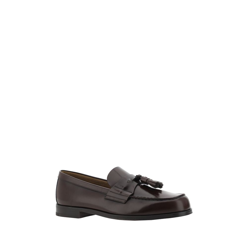 Prada Brown Calf Leather Bos Taurus Slip-On Loafers with leather tassel and patent design, ideal for AW25 season.