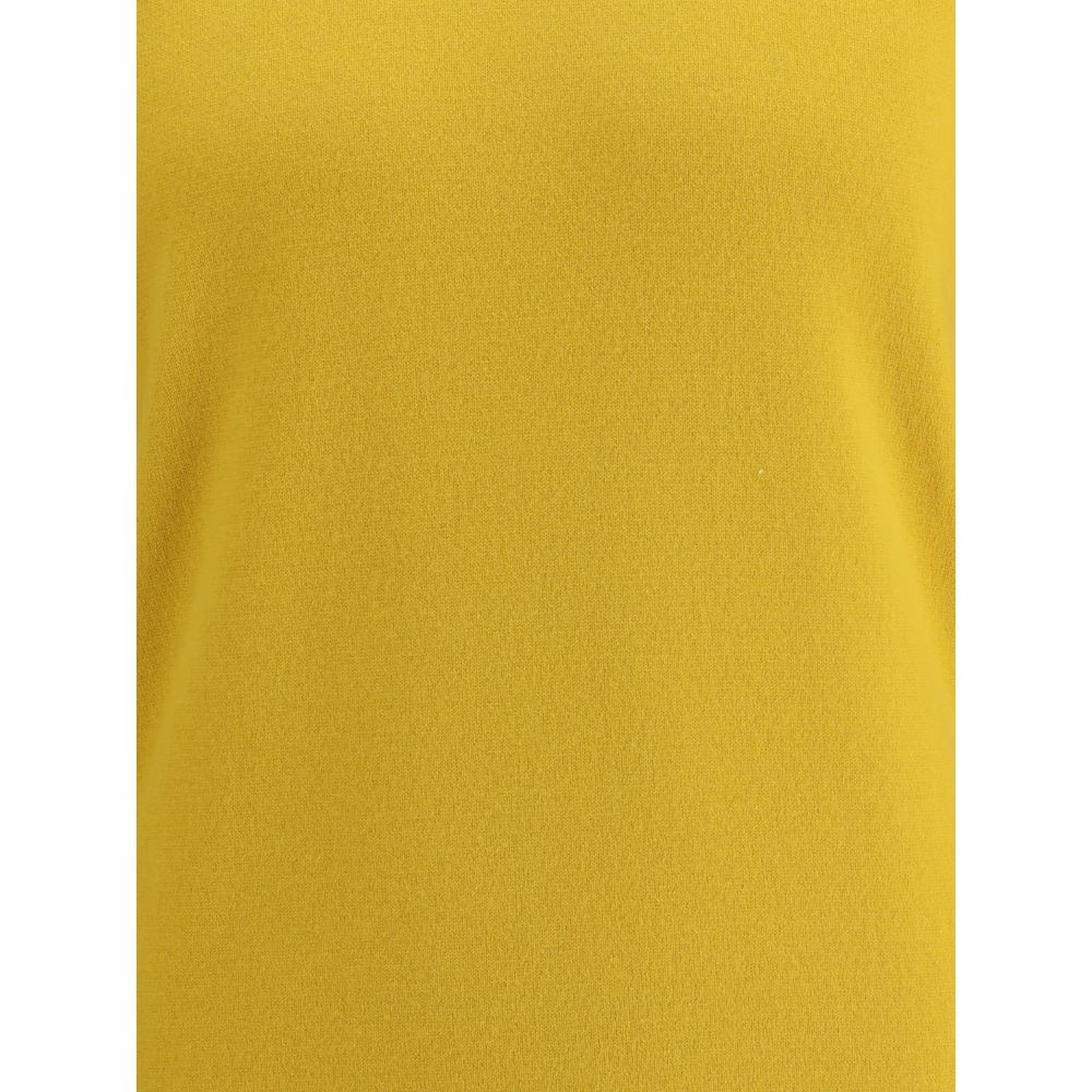 Close-up of Saint Laurent Yellow Cashmere Turtleneck, highlighting luxurious wool texture and vibrant color.