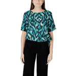 Model wearing Street One Green Viscose Blouse with round neck and short sleeves, featuring elegant gathered details for a stylish look.