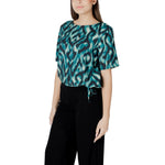 Woman wearing Street One Green Viscose Blouse with roundneck and short sleeves, showcasing elegant gathered details for summer fashion.
