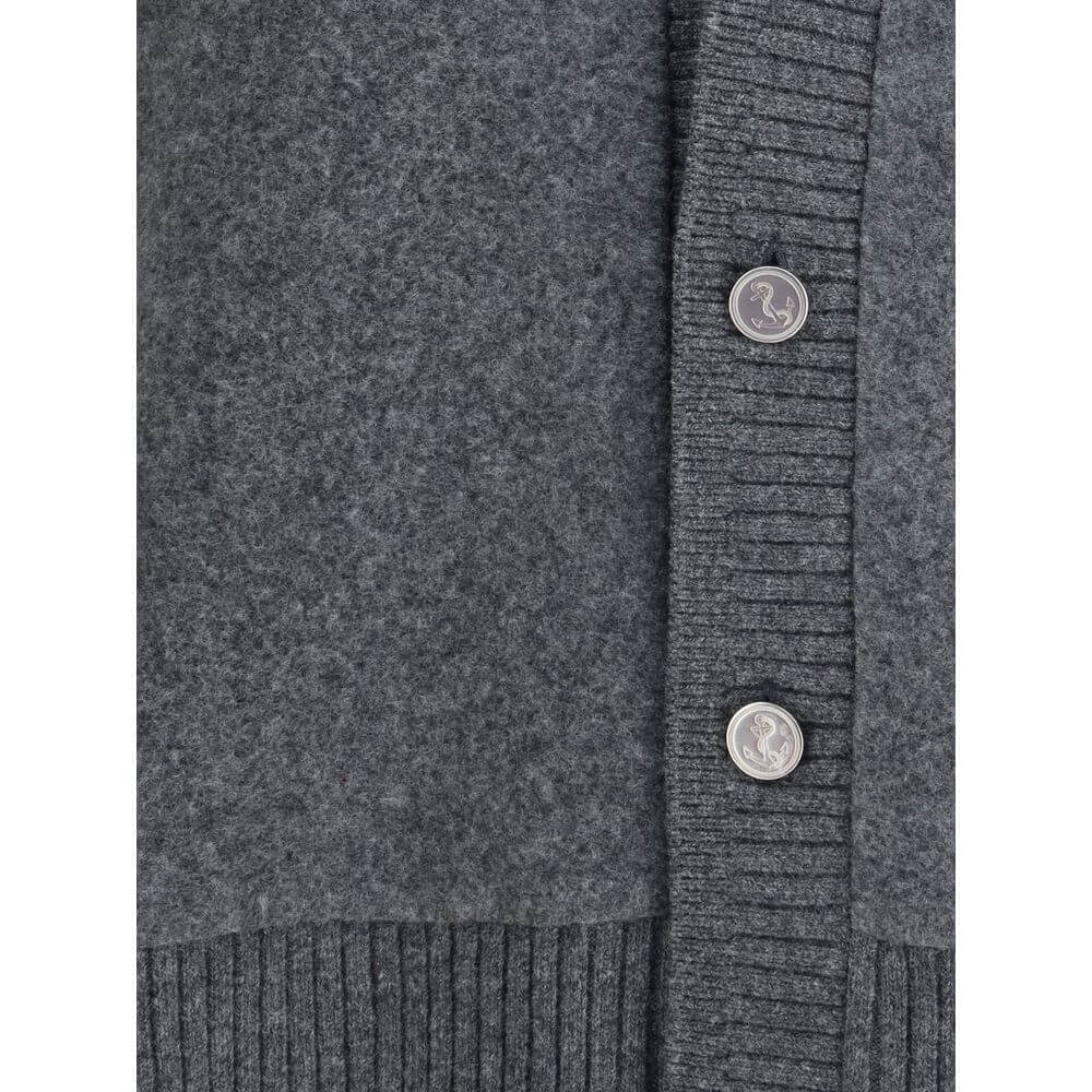Detail of Thom Browne Gray Wool Cardigan with button closure and ribbed hem, ideal for a sophisticated everyday look.