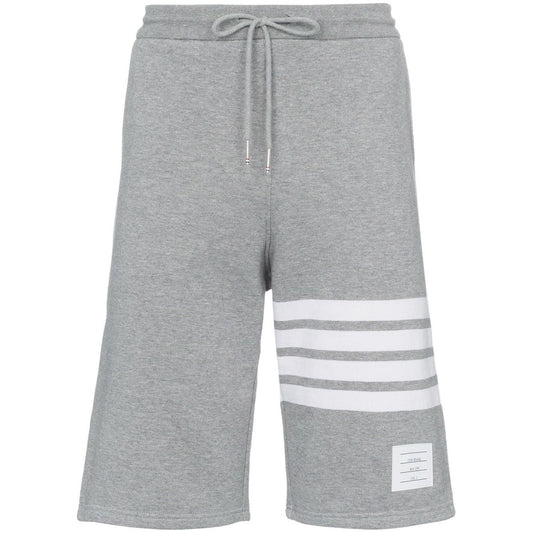 Thom Browne Shorts Light Grey with 4-Bar stripe, grosgrain ribbon trim, elastic waistband, perfect fit cotton jersey.