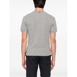 Back view of Thom Browne T-shirts and Polos Light Grey with signature grosgrain side tabs and stripe detailing.
