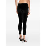 Back view of Tom Ford Trousers Black with stretch-design, elasticated logo waistband, displayed on model wearing size S.