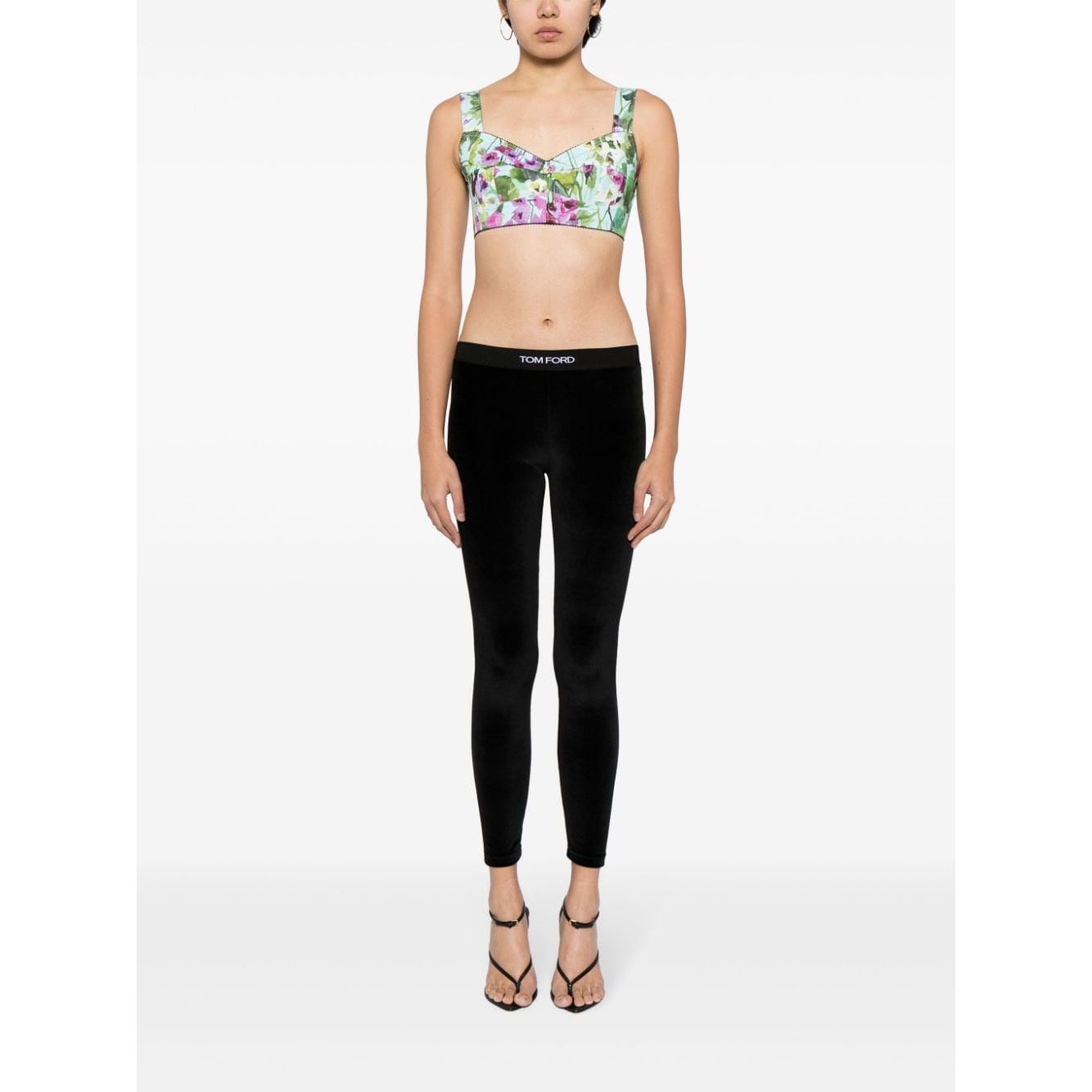 Model wearing Tom Ford Trousers Black with elasticated logo waistband, velvet leggings, true to size fit, size S.