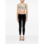 Model wearing Tom Ford Trousers Black with elasticated logo waistband, velvet leggings, true to size fit, size S.