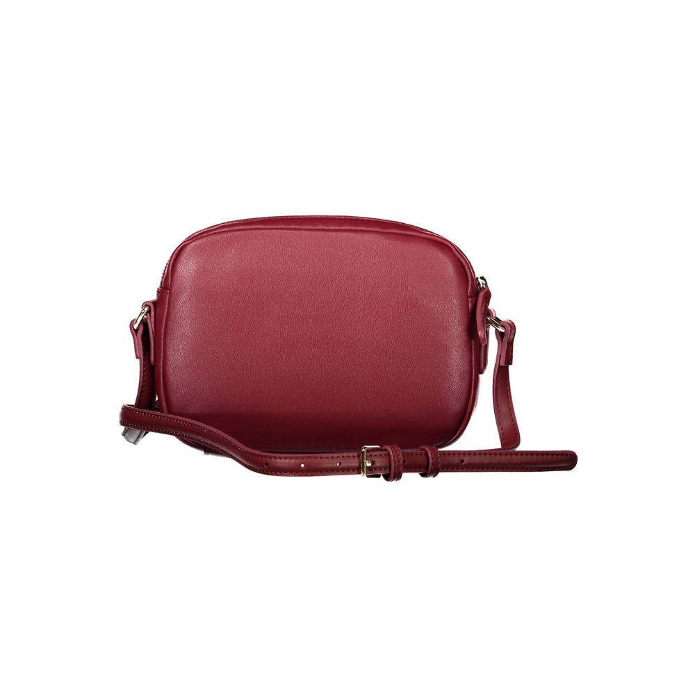 Front view with bag zipped and handles upright.