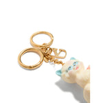 Valentino Garavani Le Chat De La Maison Nylon Bag Charm with Keychain featuring a light beige cat charm and V logo keyring.