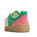 Valentino Garavani Upvillage Sneaker In Crust with hot pink and green suede, branding on sole, and vulcanized rubber sole.