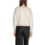 Back view of woman wearing Vero Moda White Viscose Sweater with relaxed fit and long sleeves.